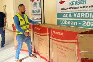 LÜBNAN'LI AİLELERE ÇAMAŞIR MAKİNESİ DAĞITIMI